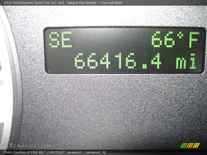 Sangria Red Metallic / Charcoal Black 2010 Ford Explorer Sport Trac XLT 4x4