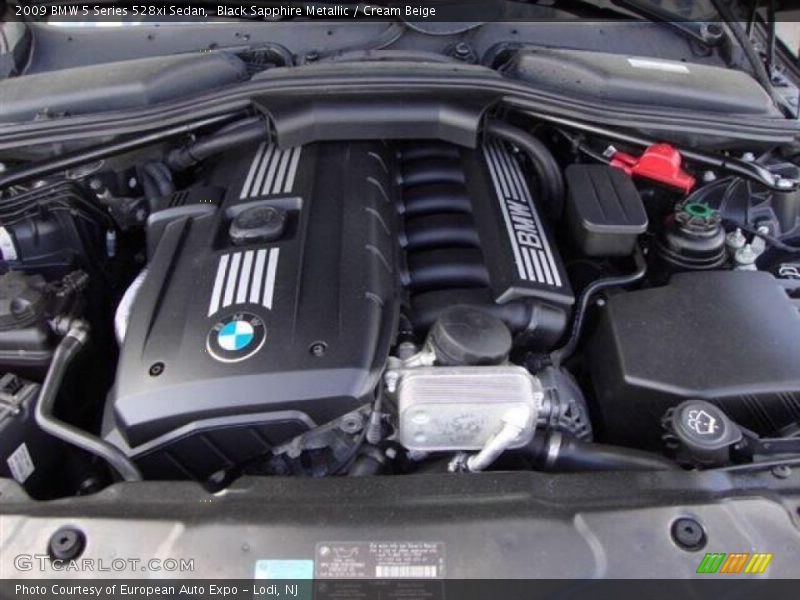 Black Sapphire Metallic / Cream Beige 2009 BMW 5 Series 528xi Sedan