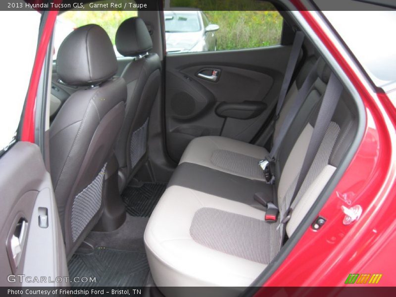 Garnet Red / Taupe 2013 Hyundai Tucson GLS