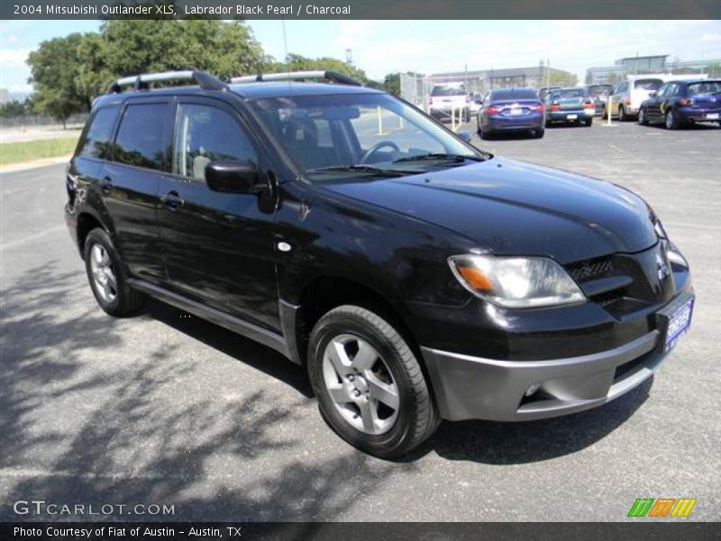 Front 3/4 View of 2004 Outlander XLS