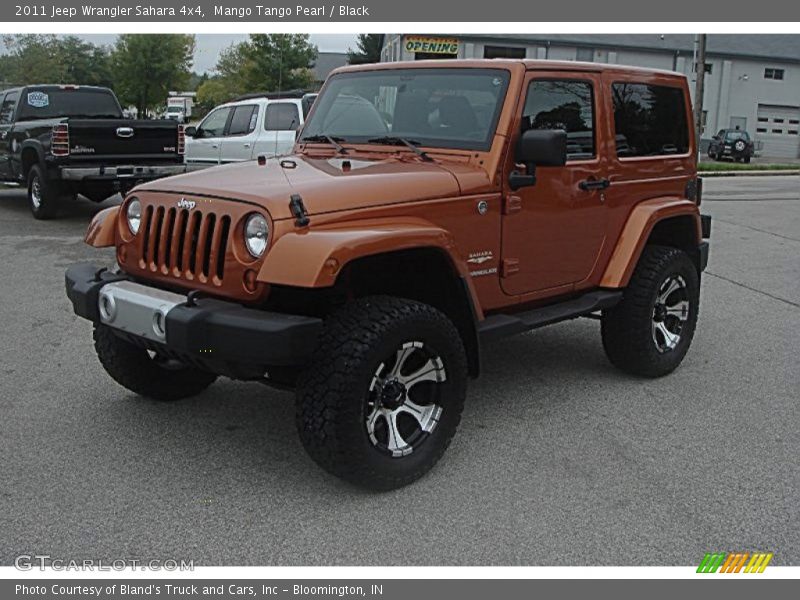 Mango Tango Pearl / Black 2011 Jeep Wrangler Sahara 4x4