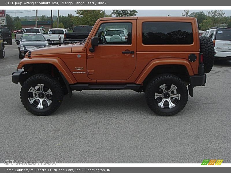 Mango Tango Pearl / Black 2011 Jeep Wrangler Sahara 4x4