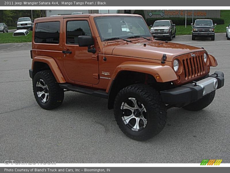 Mango Tango Pearl / Black 2011 Jeep Wrangler Sahara 4x4
