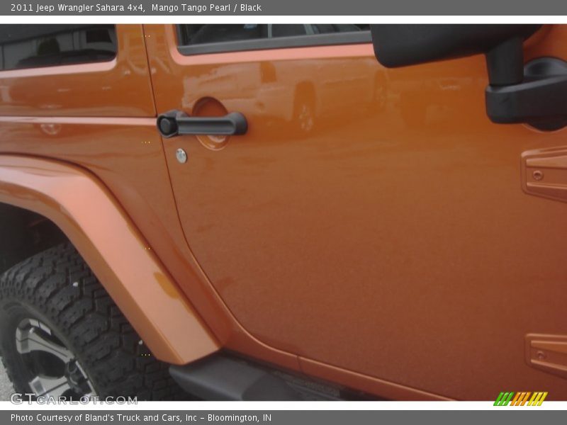 Mango Tango Pearl / Black 2011 Jeep Wrangler Sahara 4x4