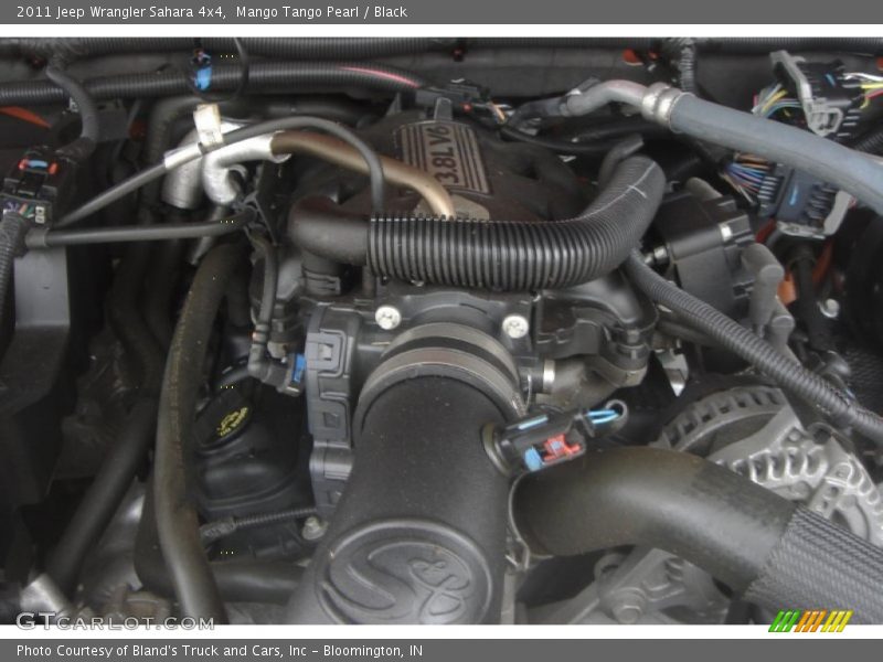 Mango Tango Pearl / Black 2011 Jeep Wrangler Sahara 4x4