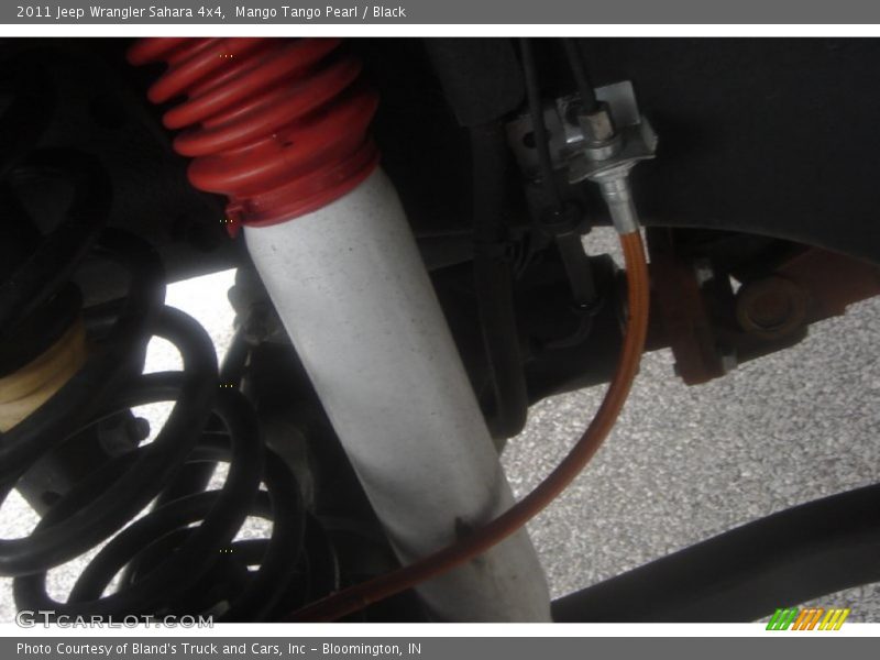 Mango Tango Pearl / Black 2011 Jeep Wrangler Sahara 4x4