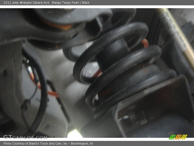 Mango Tango Pearl / Black 2011 Jeep Wrangler Sahara 4x4