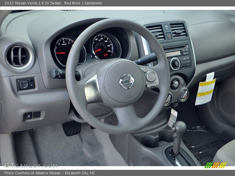 Red Brick / Sandstone 2012 Nissan Versa 1.6 SV Sedan