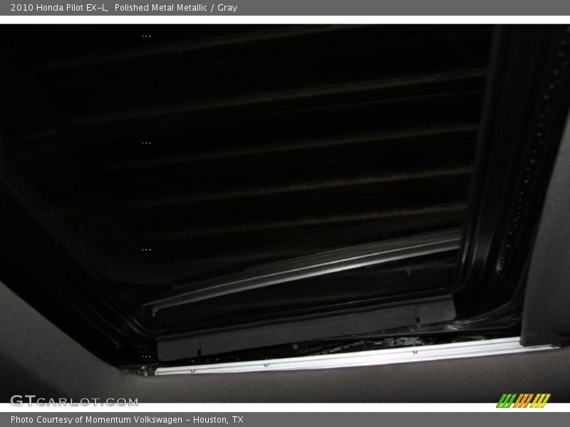 Polished Metal Metallic / Gray 2010 Honda Pilot EX-L
