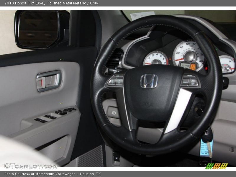 Polished Metal Metallic / Gray 2010 Honda Pilot EX-L