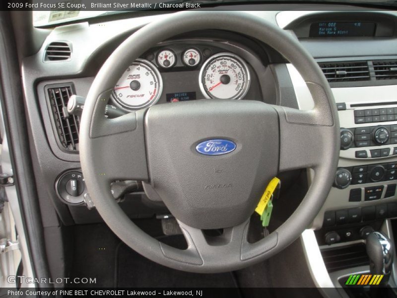Brilliant Silver Metallic / Charcoal Black 2009 Ford Focus SE Coupe