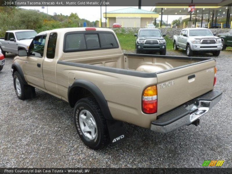 Mystic Gold Metallic / Oak 2004 Toyota Tacoma Xtracab 4x4