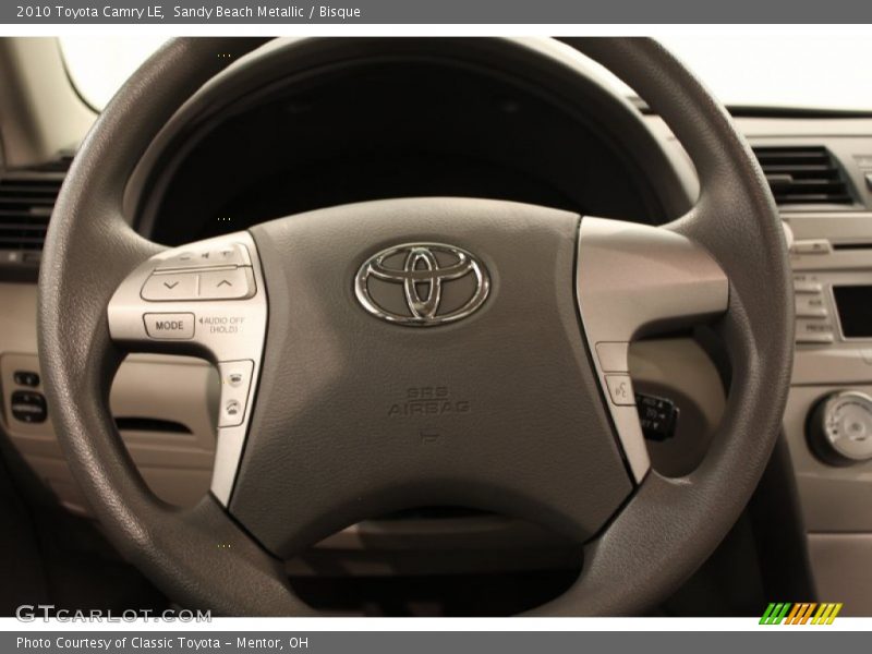 Sandy Beach Metallic / Bisque 2010 Toyota Camry LE