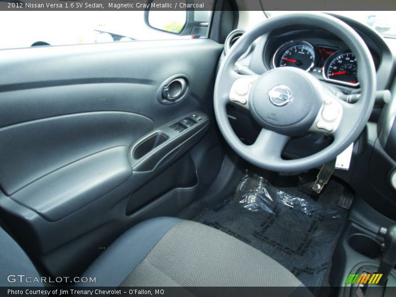 Magnetic Gray Metallic / Charcoal 2012 Nissan Versa 1.6 SV Sedan