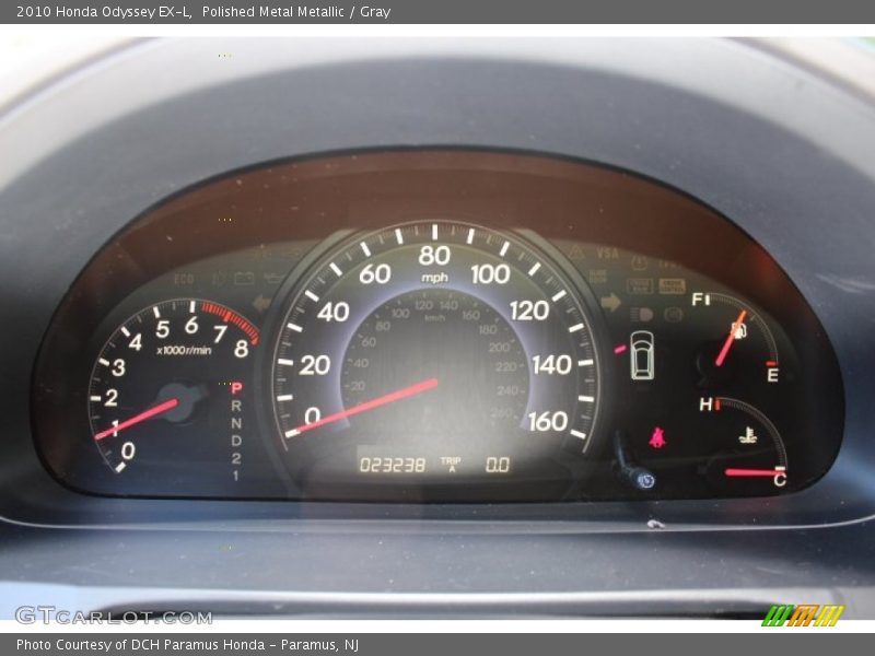 Polished Metal Metallic / Gray 2010 Honda Odyssey EX-L