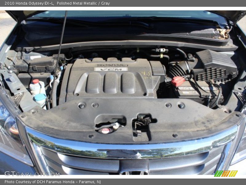 Polished Metal Metallic / Gray 2010 Honda Odyssey EX-L