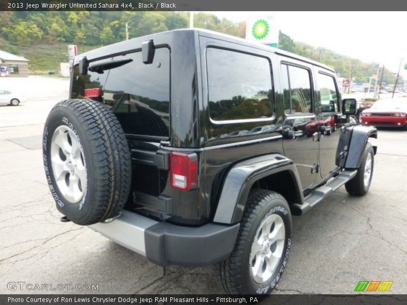 Black / Black 2013 Jeep Wrangler Unlimited Sahara 4x4