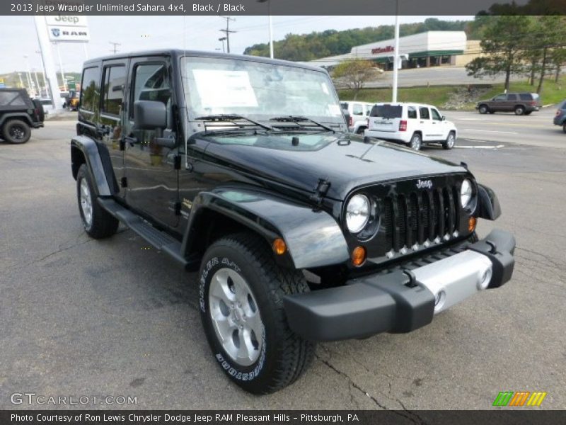Front 3/4 View of 2013 Wrangler Unlimited Sahara 4x4