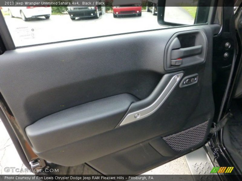 Black / Black 2013 Jeep Wrangler Unlimited Sahara 4x4