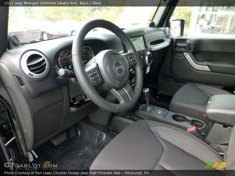 Black / Black 2013 Jeep Wrangler Unlimited Sahara 4x4