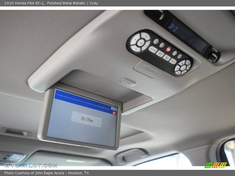 Polished Metal Metallic / Gray 2010 Honda Pilot EX-L