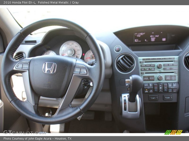 Polished Metal Metallic / Gray 2010 Honda Pilot EX-L