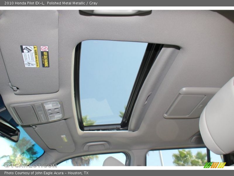 Polished Metal Metallic / Gray 2010 Honda Pilot EX-L