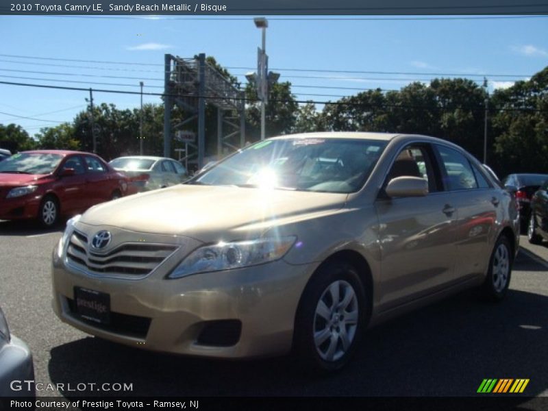 Sandy Beach Metallic / Bisque 2010 Toyota Camry LE