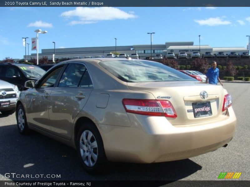 Sandy Beach Metallic / Bisque 2010 Toyota Camry LE