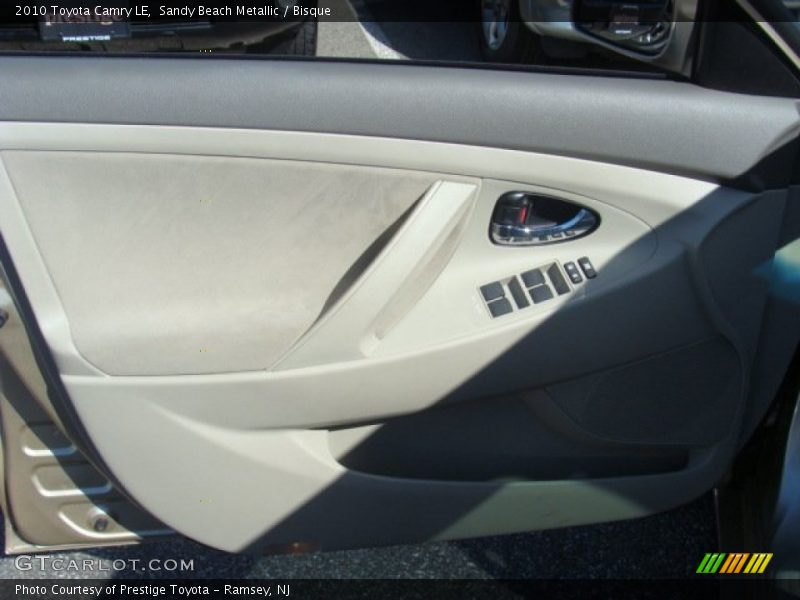 Sandy Beach Metallic / Bisque 2010 Toyota Camry LE