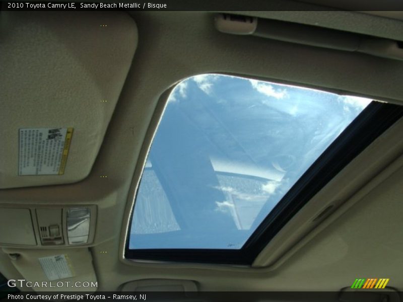 Sandy Beach Metallic / Bisque 2010 Toyota Camry LE