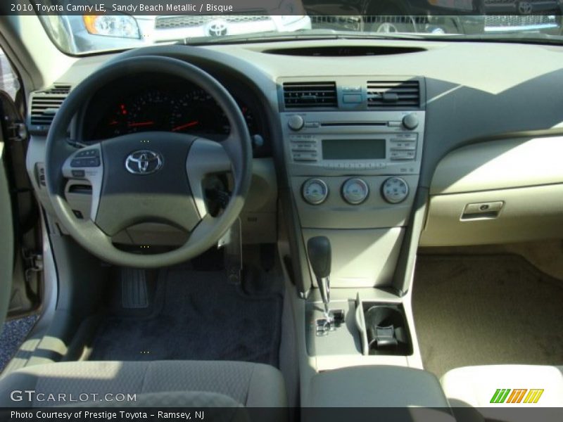 Sandy Beach Metallic / Bisque 2010 Toyota Camry LE