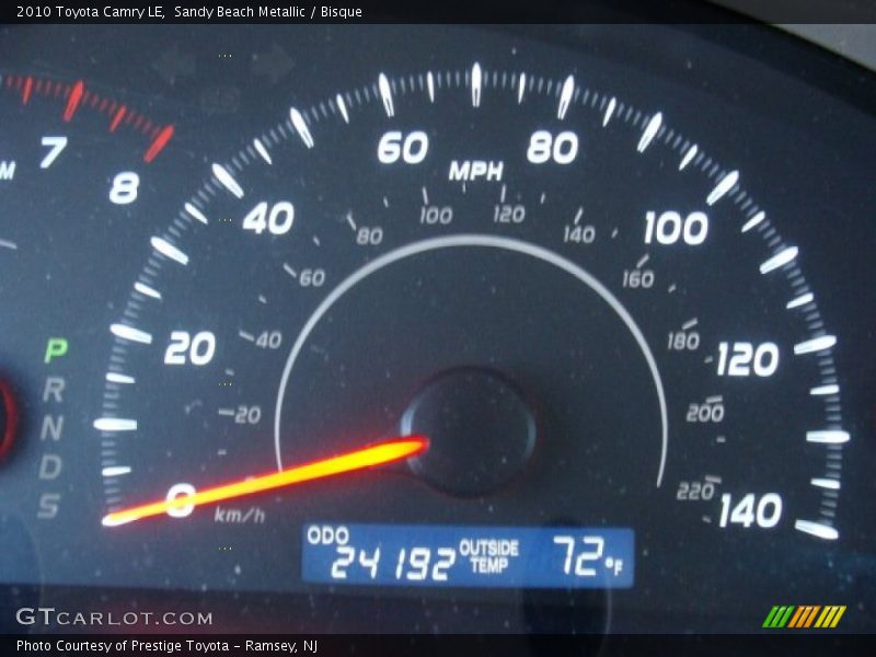 Sandy Beach Metallic / Bisque 2010 Toyota Camry LE