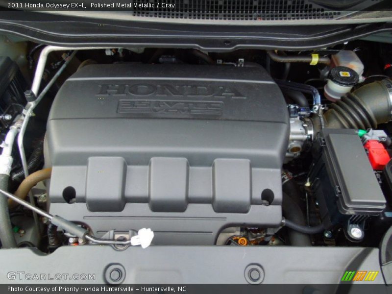 Polished Metal Metallic / Gray 2011 Honda Odyssey EX-L