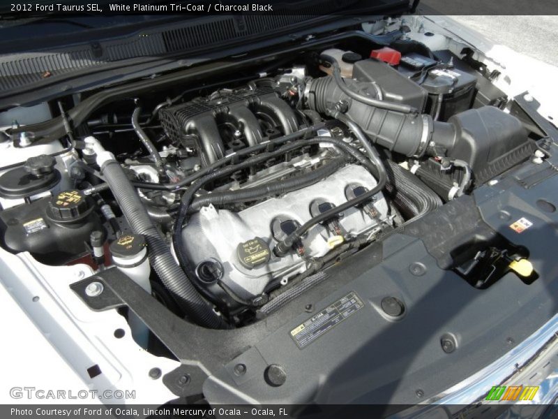 White Platinum Tri-Coat / Charcoal Black 2012 Ford Taurus SEL