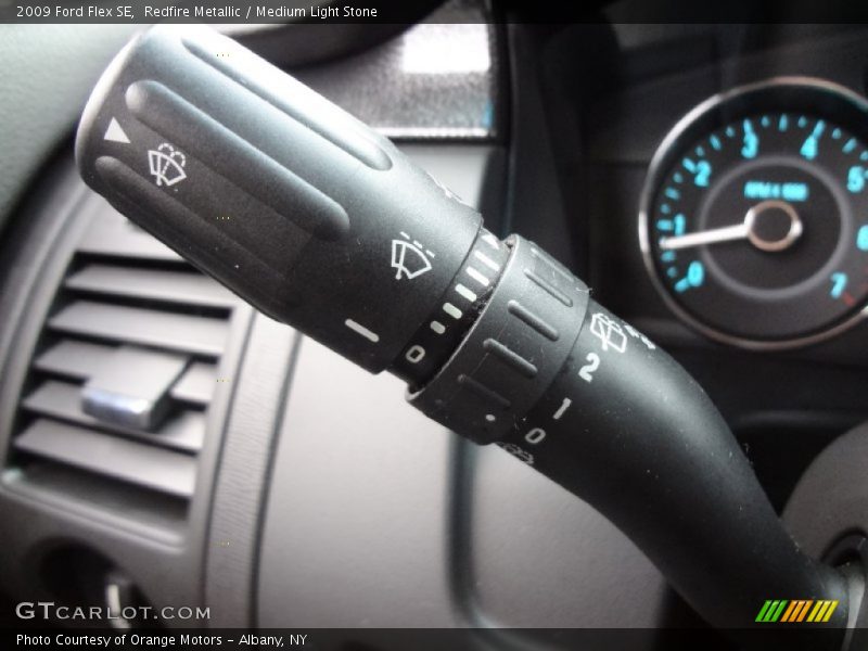 Redfire Metallic / Medium Light Stone 2009 Ford Flex SE