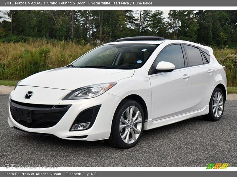 Front 3/4 View of 2011 MAZDA3 s Grand Touring 5 Door