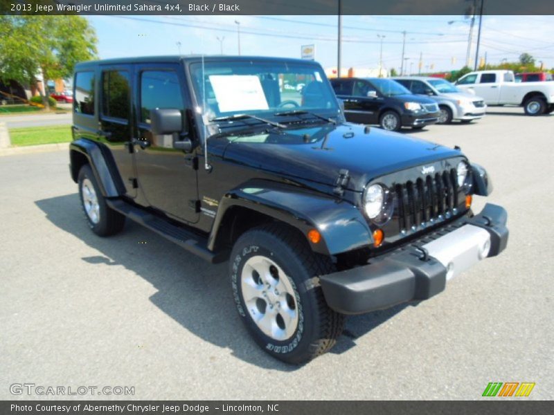 Black / Black 2013 Jeep Wrangler Unlimited Sahara 4x4