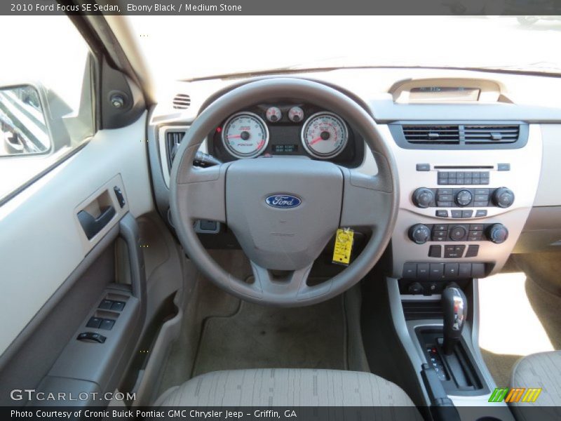 Ebony Black / Medium Stone 2010 Ford Focus SE Sedan