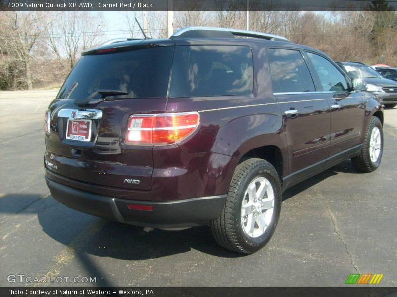 Garnet Red / Black 2009 Saturn Outlook XR AWD