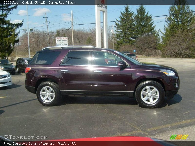 Garnet Red / Black 2009 Saturn Outlook XR AWD