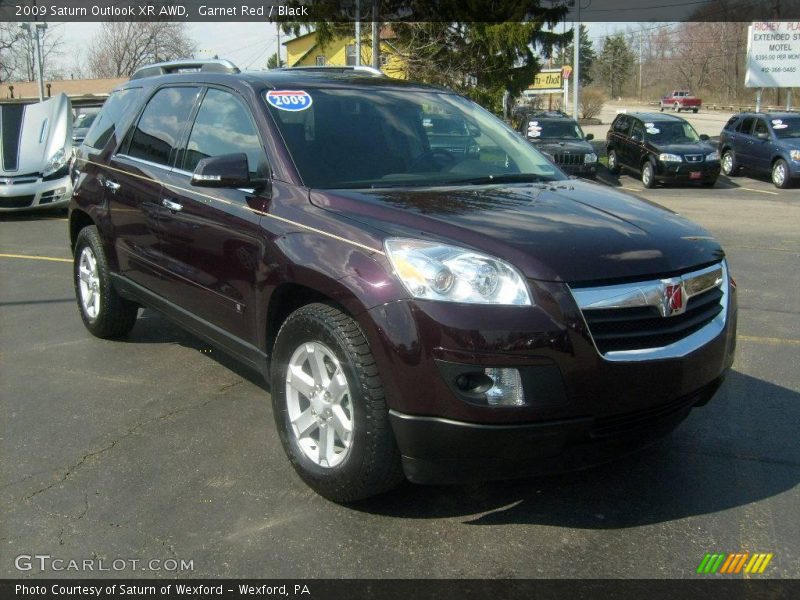 Garnet Red / Black 2009 Saturn Outlook XR AWD