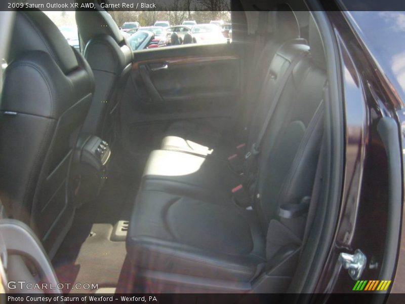 Garnet Red / Black 2009 Saturn Outlook XR AWD