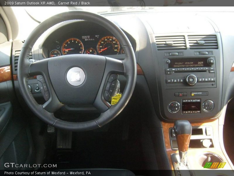 Garnet Red / Black 2009 Saturn Outlook XR AWD