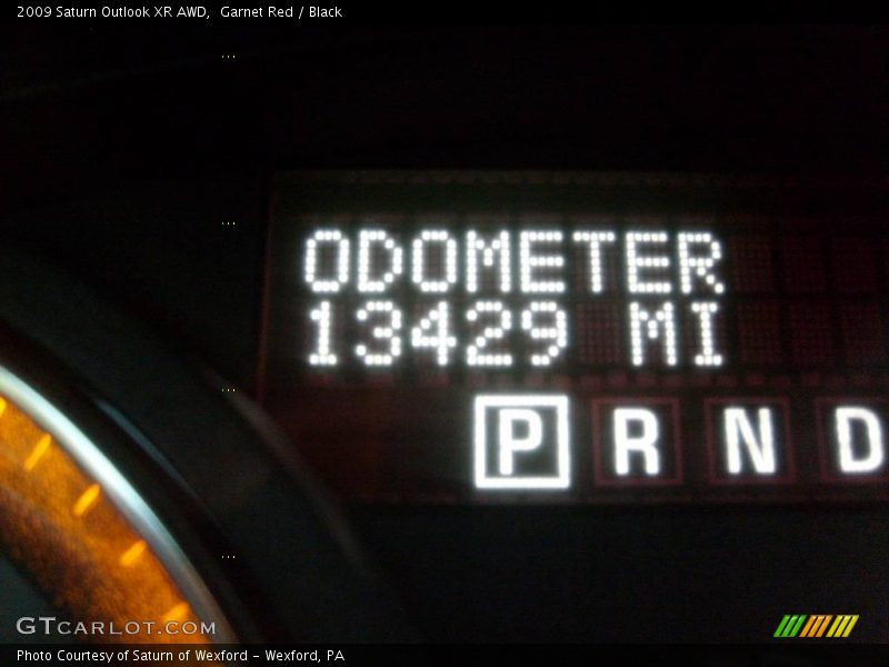 Garnet Red / Black 2009 Saturn Outlook XR AWD