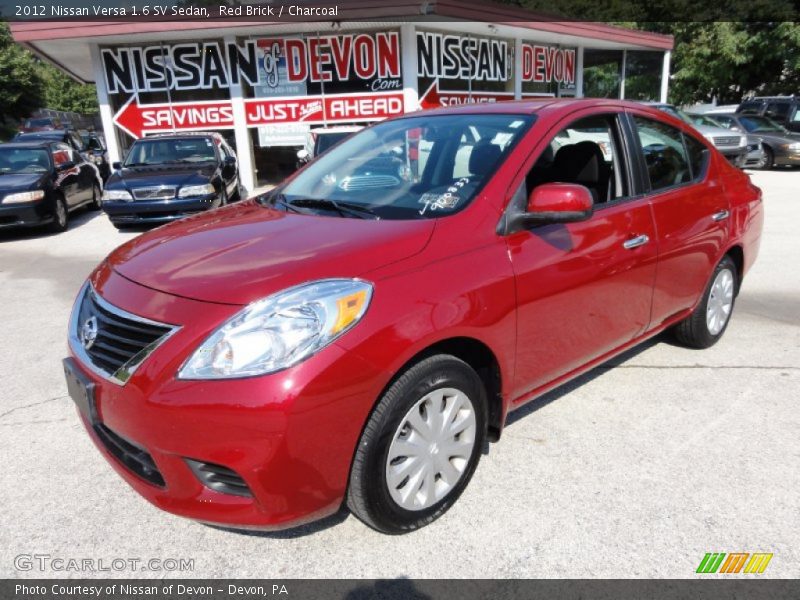 Red Brick / Charcoal 2012 Nissan Versa 1.6 SV Sedan