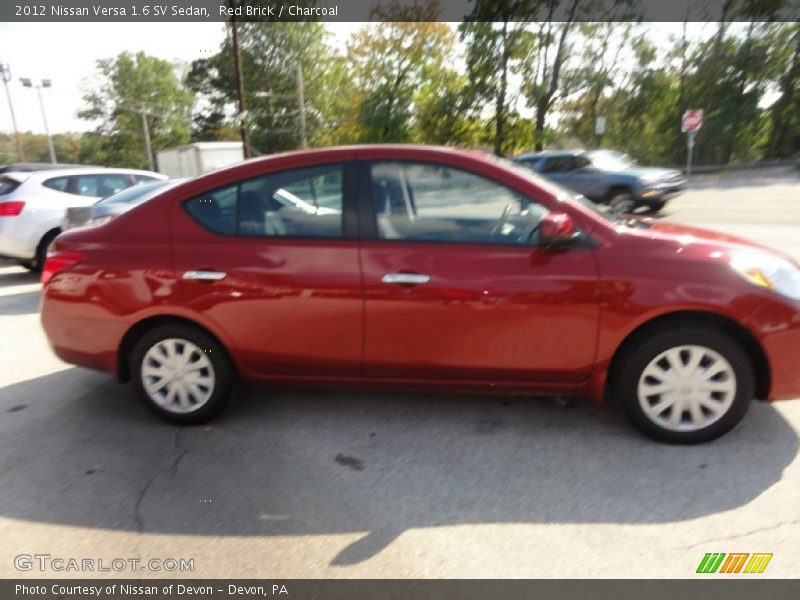 Red Brick / Charcoal 2012 Nissan Versa 1.6 SV Sedan