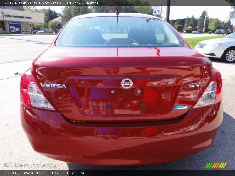Red Brick / Charcoal 2012 Nissan Versa 1.6 SV Sedan