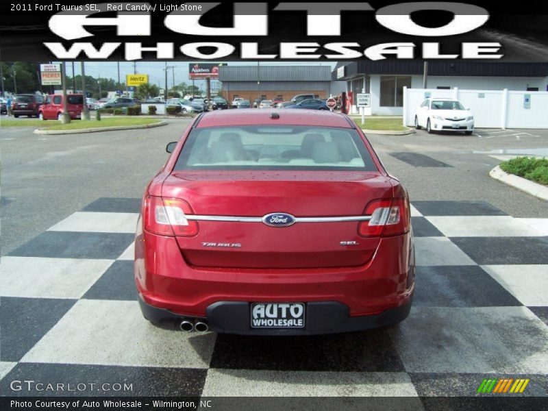 Red Candy / Light Stone 2011 Ford Taurus SEL