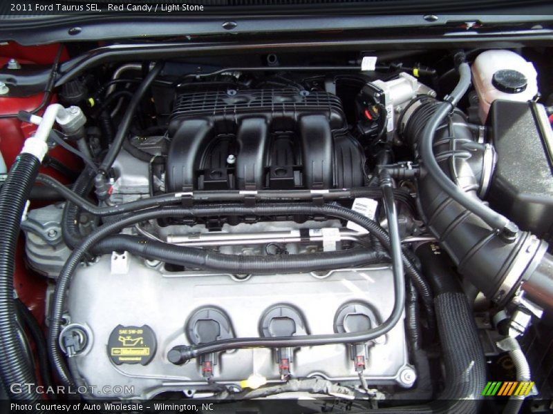 Red Candy / Light Stone 2011 Ford Taurus SEL